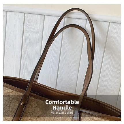 حقيبة يد كبيرة بمقابض طويلة