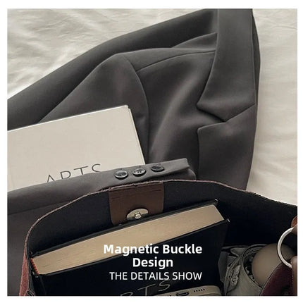 حقيبة يد كبيرة بتصميم مفتوح ومقبض واحد