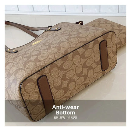 حقيبة يد كبيرة بمقابض طويلة