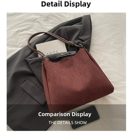 حقيبة يد كبيرة بتصميم مفتوح ومقبض واحد