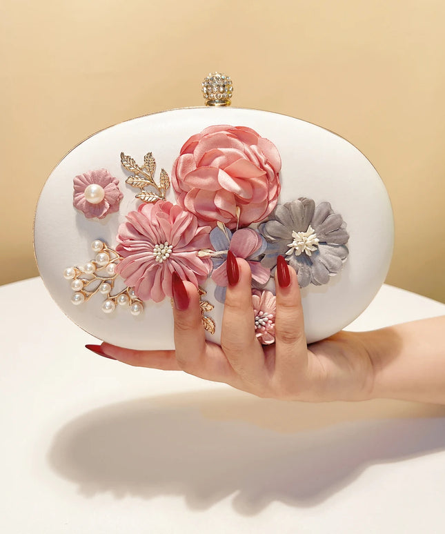 حقيبة كف صلبة مزينة بورود