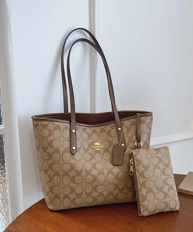 حقيبة يد كبيرة بمقابض طويلة