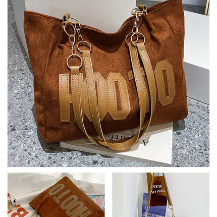 حقيبة يد متوسطة بمقابض علوية وحزام كتف