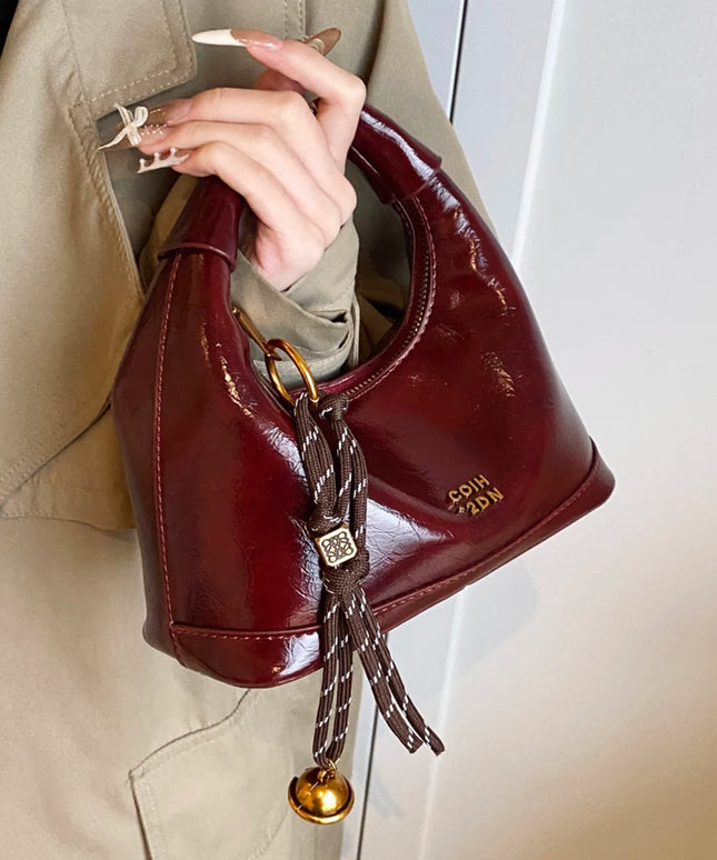 حقيبة يد وكتف بتصميم هلالي