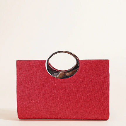 حقيبة كف مزخرفة بمقبض علوي