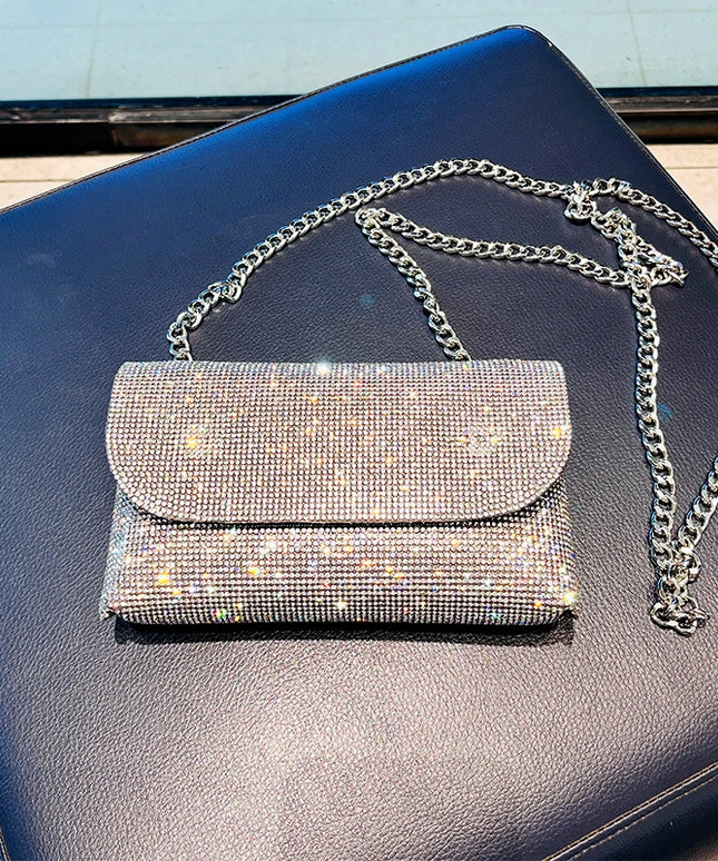 حقيبة مرصعة بأحجار لامعة مع سلسلة معدنية