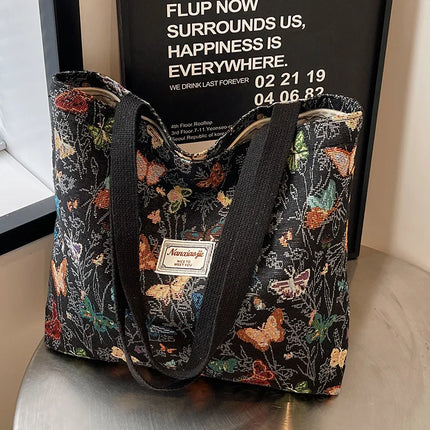 حقيبة كتف بنقوش ملونة وجيوب متعددة