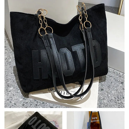 حقيبة يد متوسطة بمقابض علوية وحزام كتف