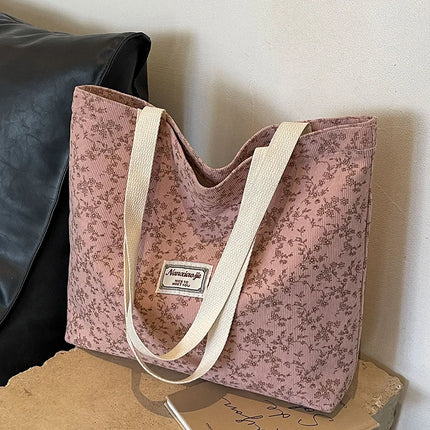 حقيبة كتف بنقوش ملونة وجيوب متعددة