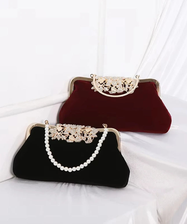 حقيبة كف صلبة مزينة بسلسلة معدنية