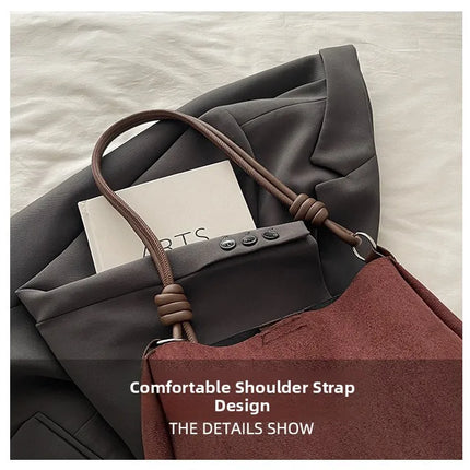 حقيبة يد كبيرة بتصميم مفتوح ومقبض واحد